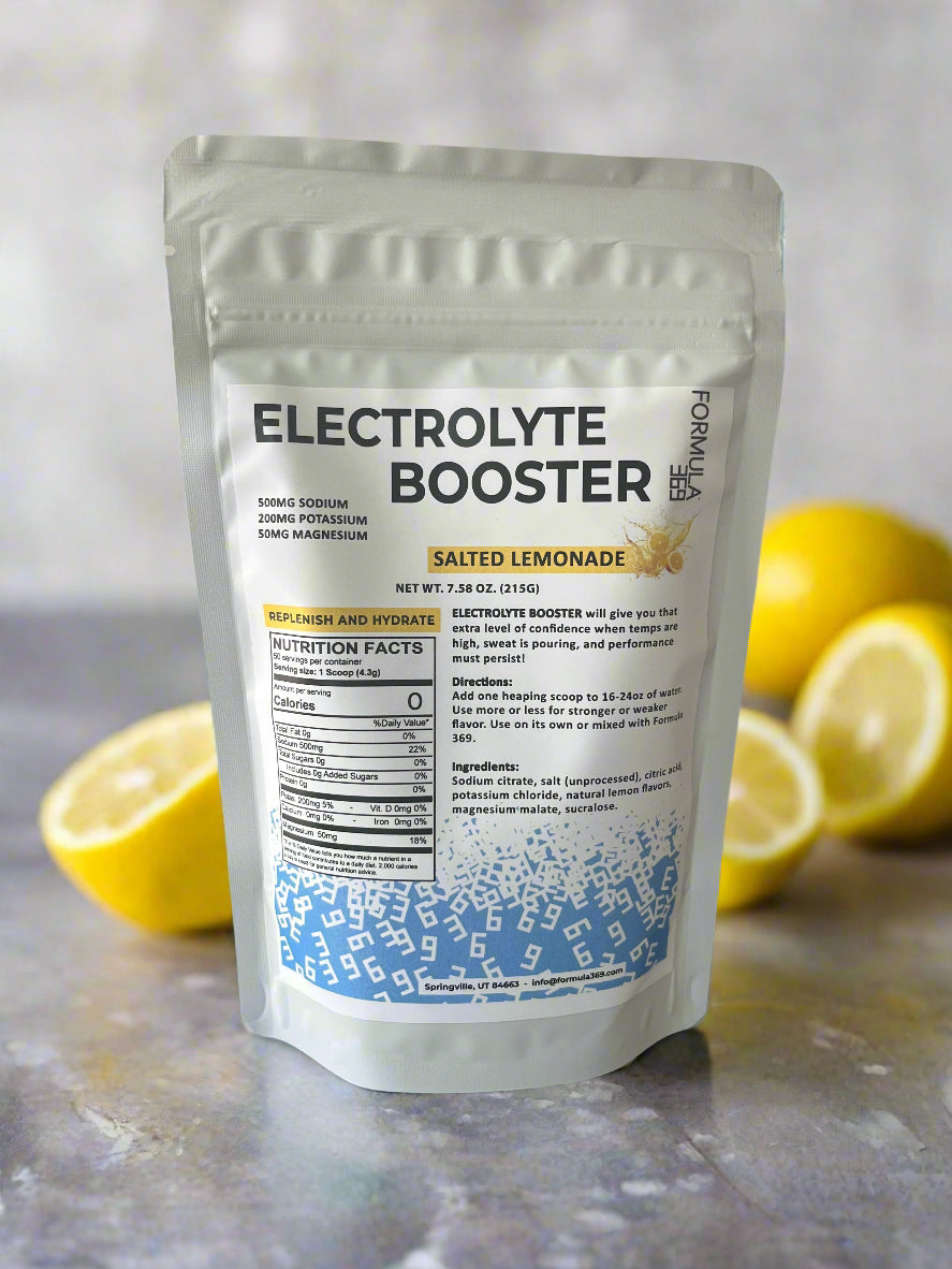 Formula 369 Electrolyte booster package with lemons on a gray surface
